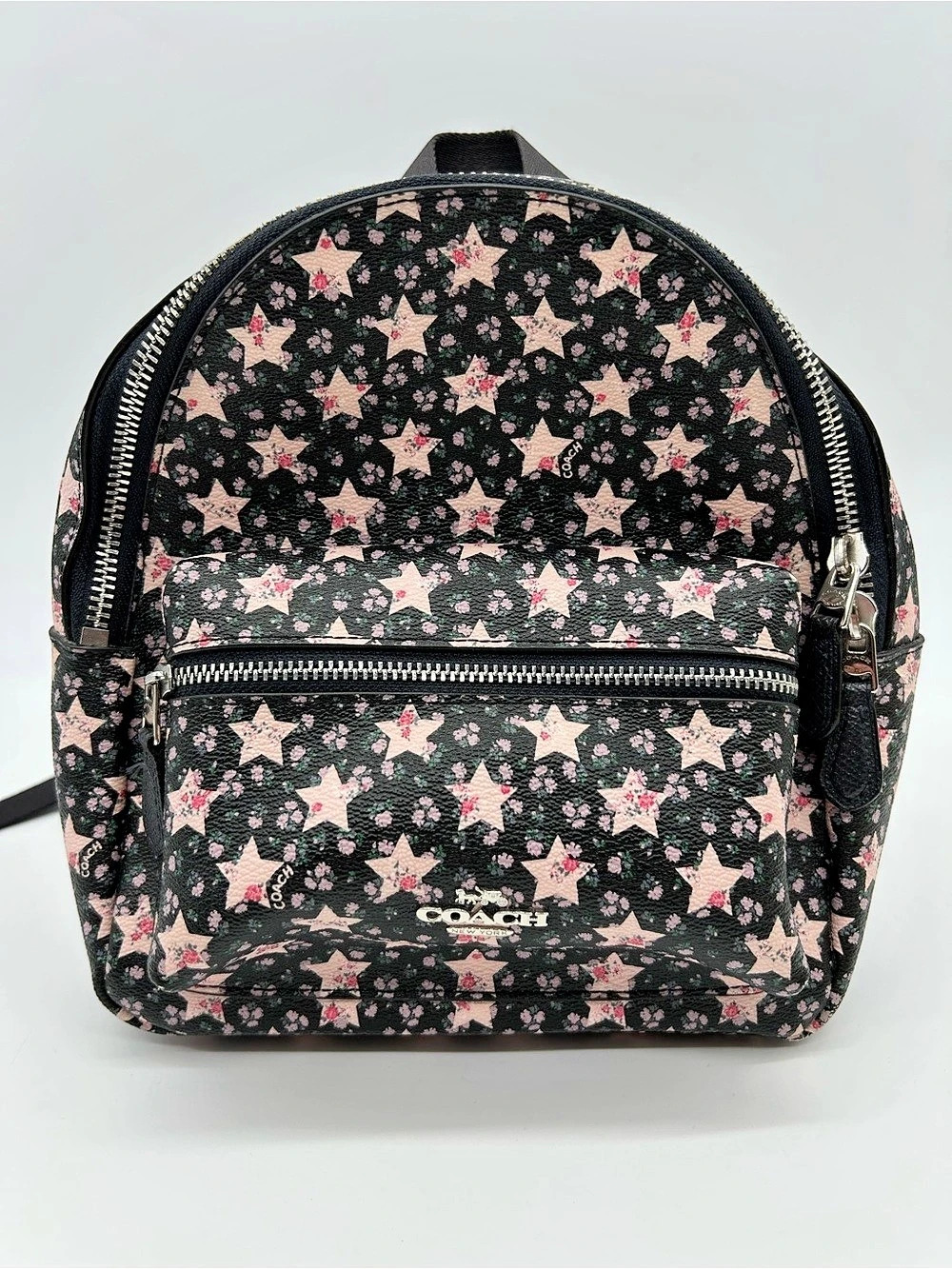 COACH Mini Charlie Backpack in Black Coated Canvas with Pink Floral Star Print